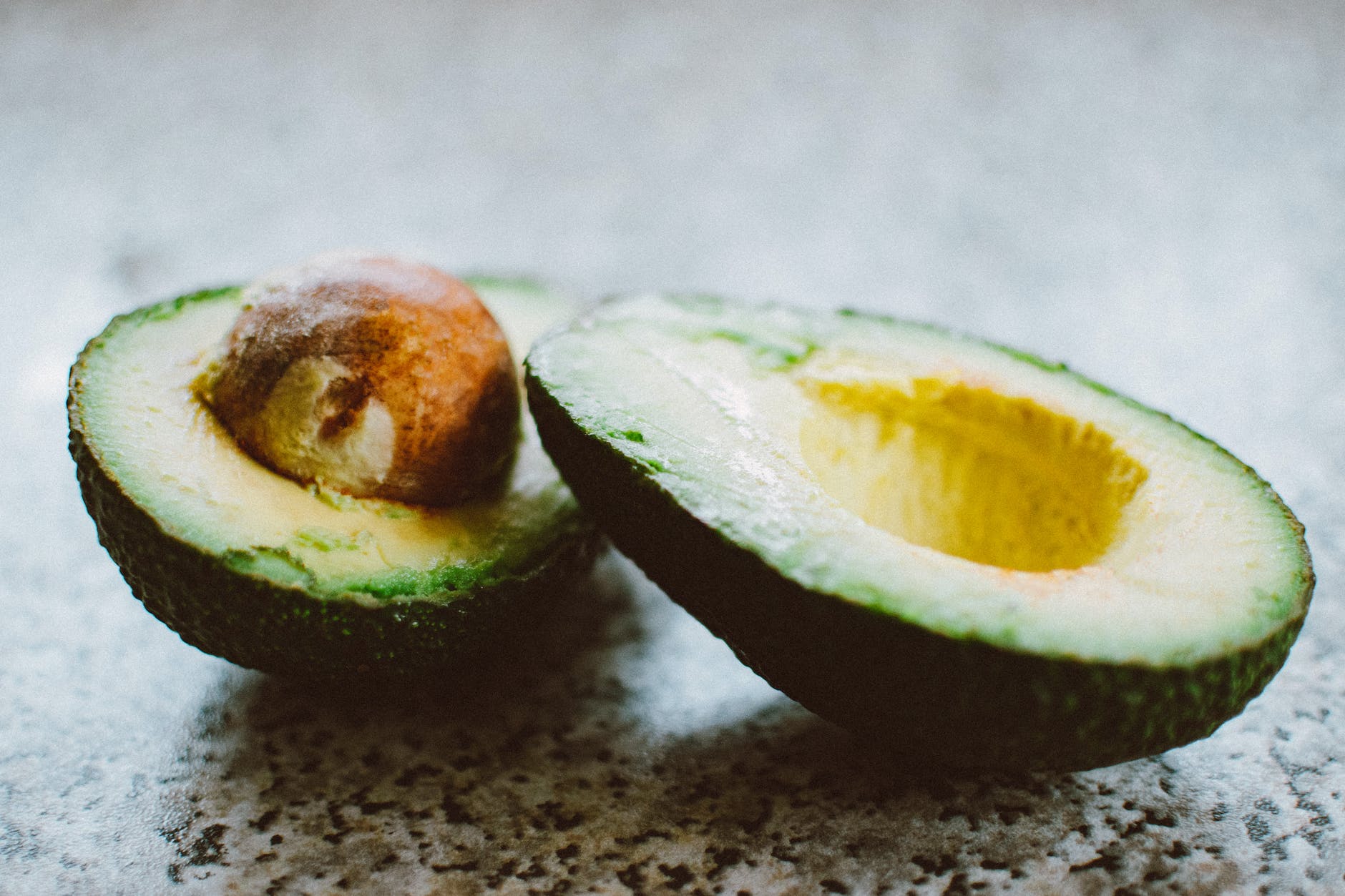 selective focus photography of sliced avocado